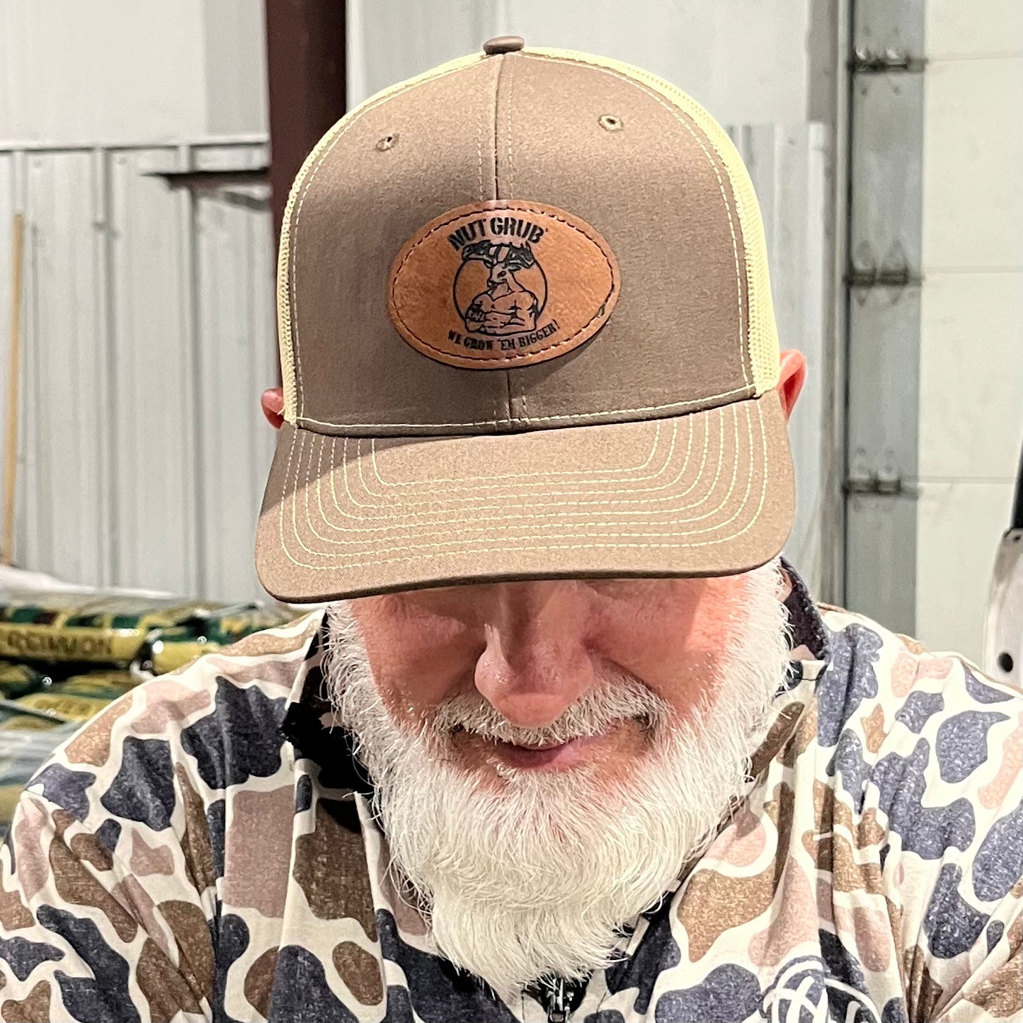 The Nut Grub Buff Buck Cap